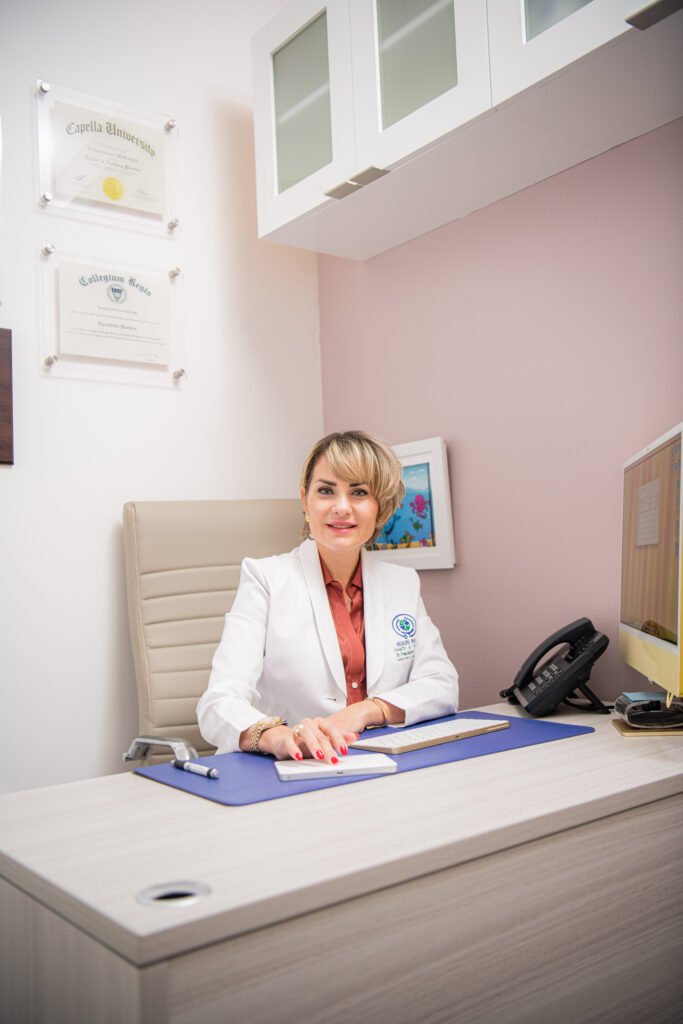 Doctor seated in a Miami office at dusk, representing sleep problems and mental health support.